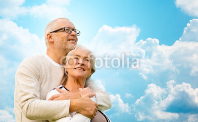 happy_senior_couple_over_blue_sky_and_clouds.jpg